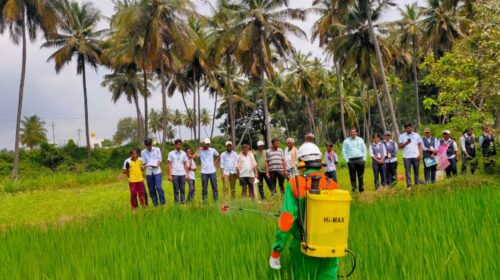 Students demonstrating plant protection kit as part of Agricultural Engineering interventions in Agriculture